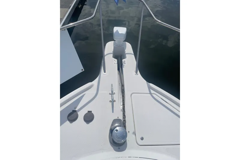 Slide: The Image of Bow of 1999 Bayliner 4087 Aft Cabin Motoryacht with anchor chain and railing. - 3