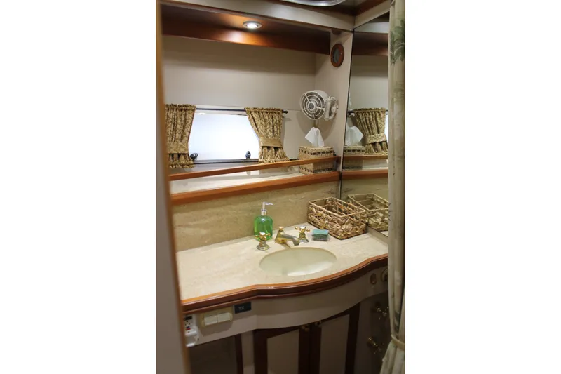 Slide: The Image of Luxurious bathroom interior of 1997 McKinna 48 Pilothouse yacht with elegant fixtures. - 65
