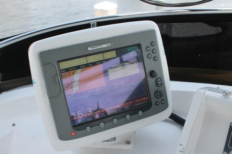 Slide: The Image of Navigation system on a 1997 McKinna 48 Pilothouse yacht, displaying marine charts. - 53