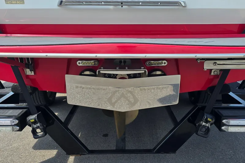 Slide: The Image of Rear view of a 2011 Malibu Wakesetter 247 LSV boat on a trailer. - 8