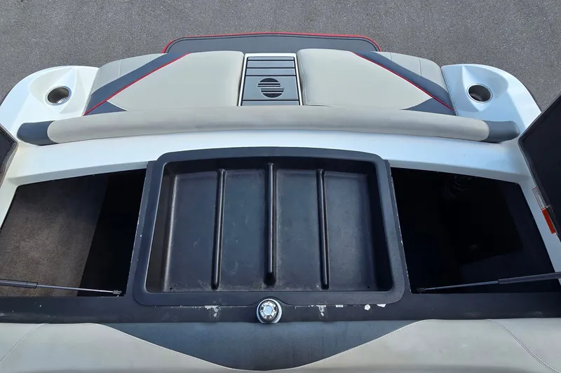 Slide: The Image of 2011 Malibu Wakesetter 247 LSV rear seating and storage compartments. - 17