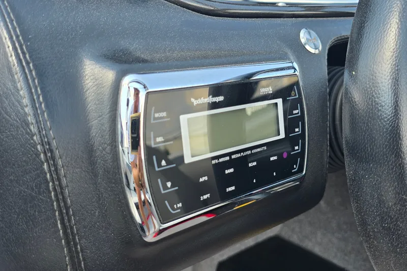 Slide: The Image of Close-up of a Rockford Fosgate media player in a 2011 Malibu Wakesetter 247 LSV boat. - 20