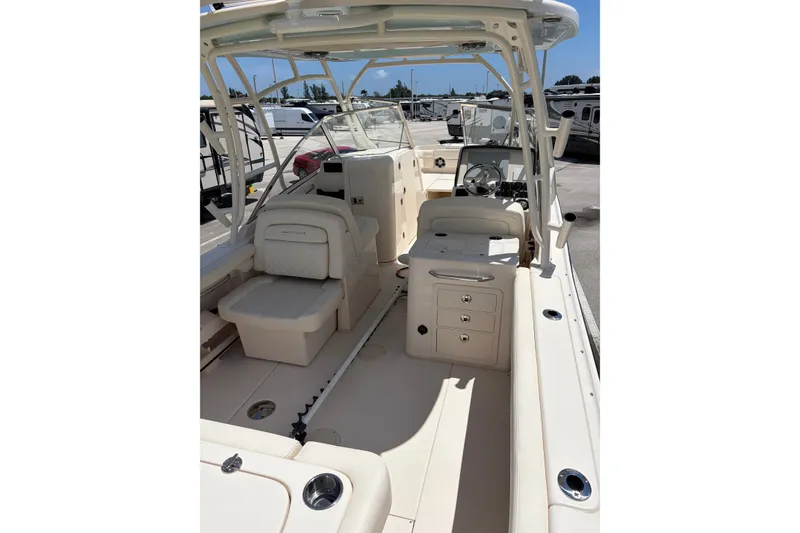 Slide: The Image of 2025 Grady-White Freedom 275 boat interior with seating and helm station. - 11