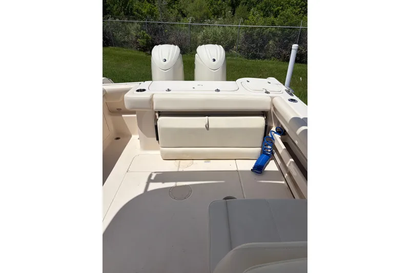 Slide: The Image of 2025 Grady-White Freedom 275 boat interior with seating and storage compartments. - 8