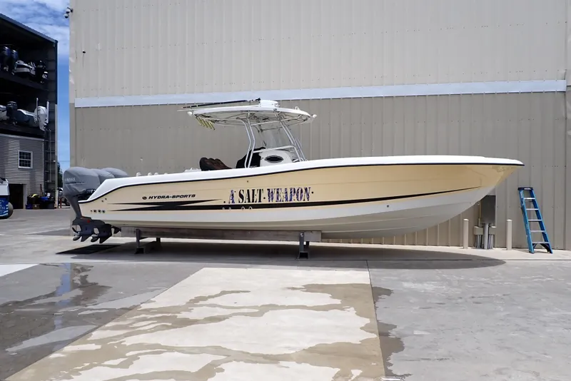 The Image of 2005 Hydra-Sports Vector 3300 CC boat on dry dock, labeled "A Salt Weapon." - 0