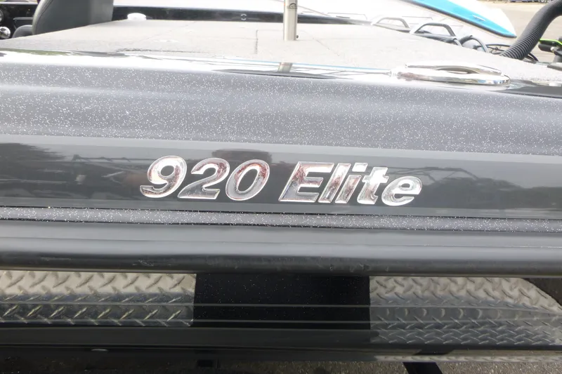 Slide: The Image of Phoenix 920 Elite 2025 model nameplate on a sleek, metallic surface. - 19