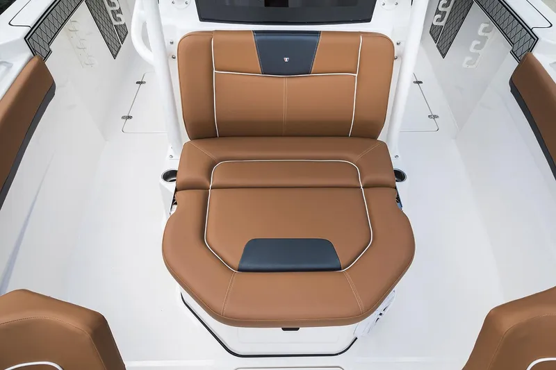 Slide: The Image of Manufacturer Provided Image: 2026 Wellcraft 302 Fisherman boat seat, brown leather upholstery, modern design. - 5