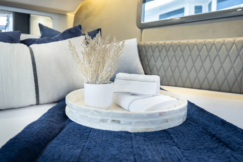Slide: The Image of Luxurious interior of 2026 Hanover 347 with elegant bedding and decor accents. - 34
