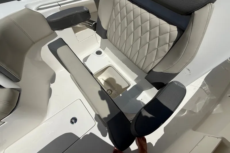 Slide: The Image of 2027 Key West 249 FS boat seat with quilted upholstery and storage compartment. - 19