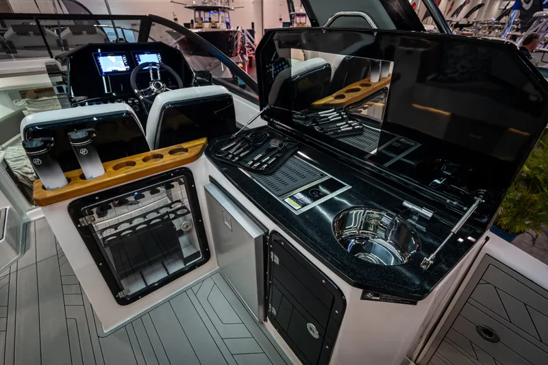 Slide: The Image of Luxurious Hanover 347 yacht interior with modern kitchen and navigation controls, 2026 model. - 4
