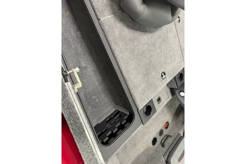 Slide: The Image of 2024 Tracker Pro Team 175 TXW Tournament Edition boat interior storage compartment. - 17
