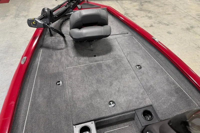Slide: The Image of 2024 Tracker Pro Team 175 TXW Tournament Edition boat interior with gray seating and red trim. - 21
