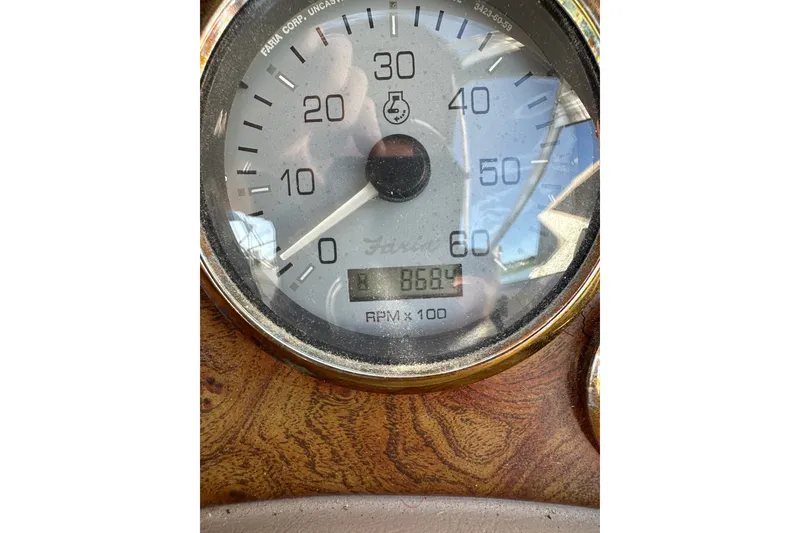 Slide: The Image of Close-up of a Wellcraft 2600 Martinique 2000 boat tachometer showing 868.4 RPM. - 19
