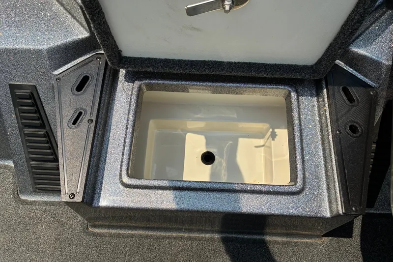 Slide: The Image of Open storage compartment in a 2020 Ranger Z185 boat. - 22