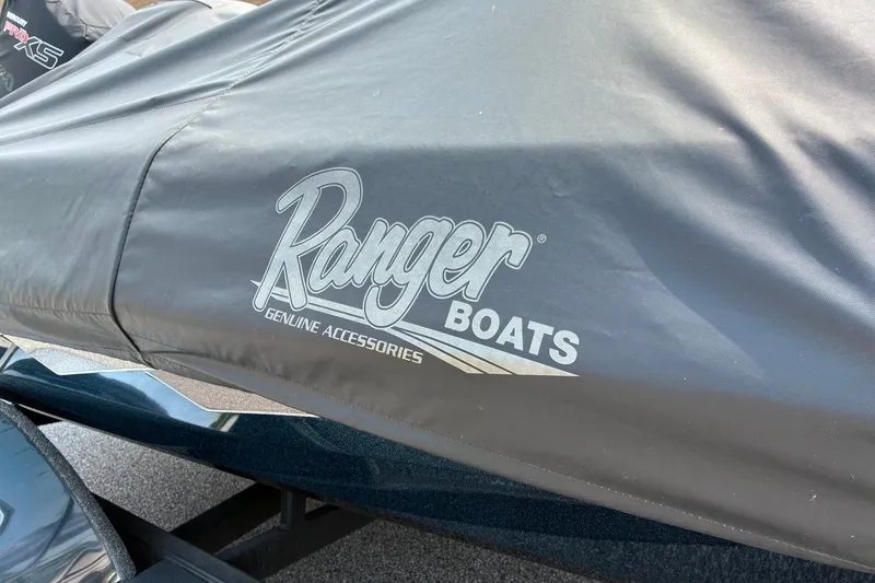 Slide: The Image of Protective cover on 2020 Ranger Z185 boat with logo and genuine accessories branding. - 29