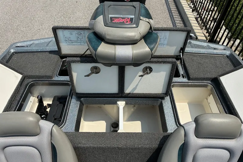 Slide: The Image of 2020 Ranger Z185 boat interior with open storage compartments and seating. - 23
