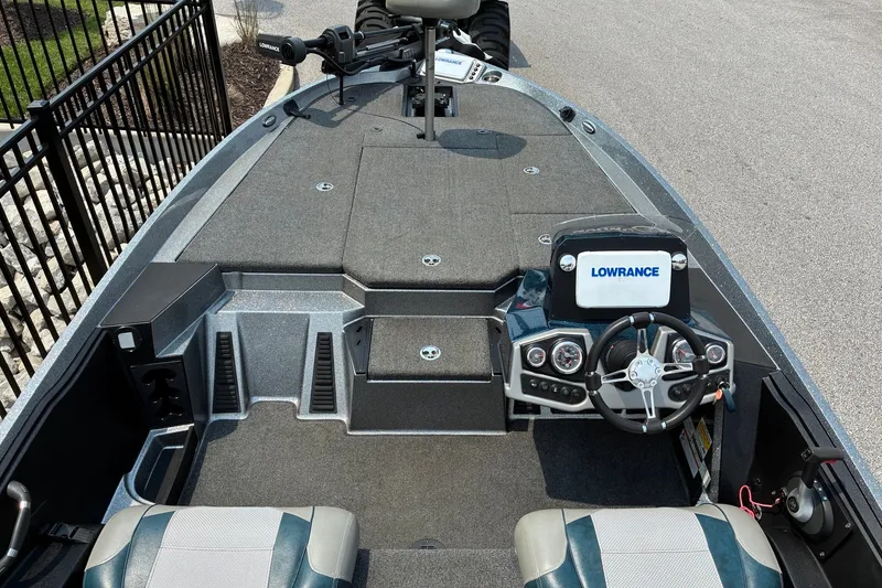 Slide: The Image of 2020 Ranger Z185 boat interior with Lowrance electronics and steering wheel. - 15