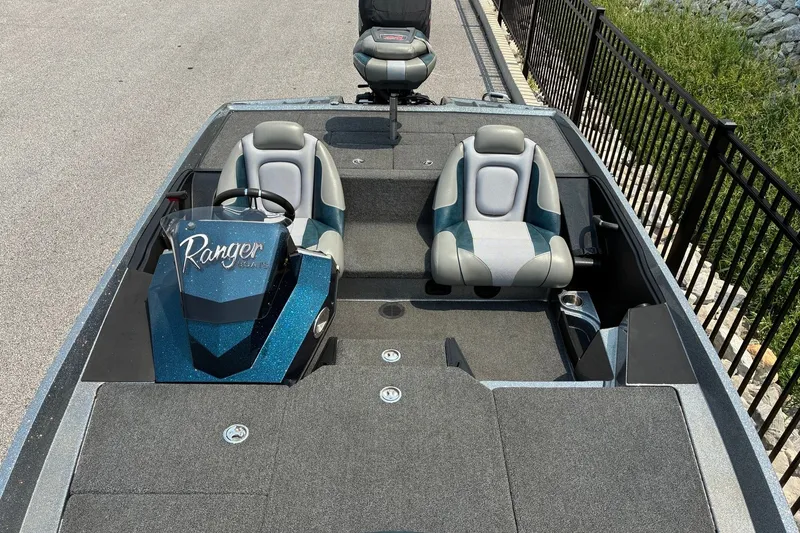 Slide: The Image of 2020 Ranger Z185 boat interior with dual seats and steering console. - 18