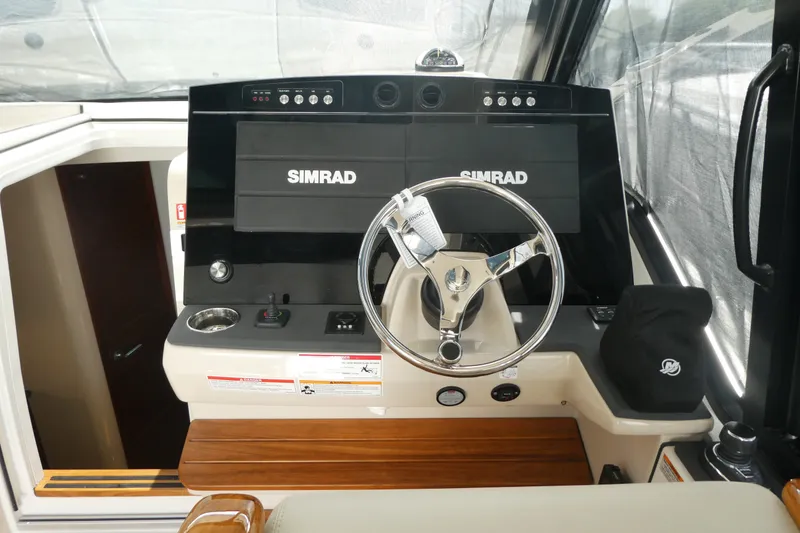 Slide: The Image of Helm of 2026 Boston Whaler 405 Conquest with Simrad navigation system. - 19