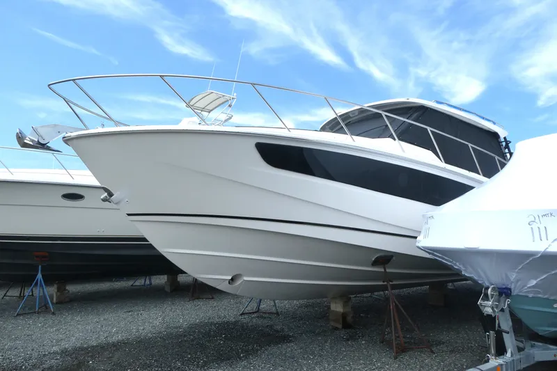 The Image of 2026 Boston Whaler 405 Conquest boat on display under a clear blue sky. - 0