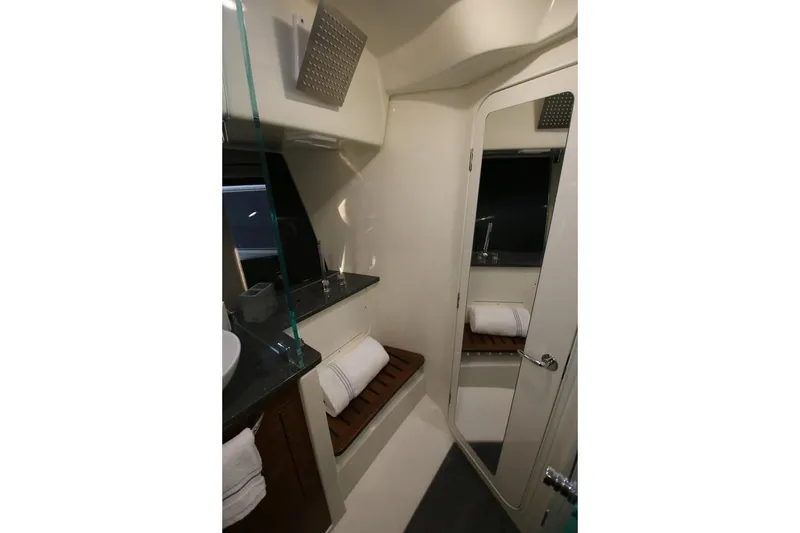 Slide: The Image of Manufacturer Provided Image: Bathroom interior of 2026 Boston Whaler 405 Conquest, featuring modern design and amenities. - 30