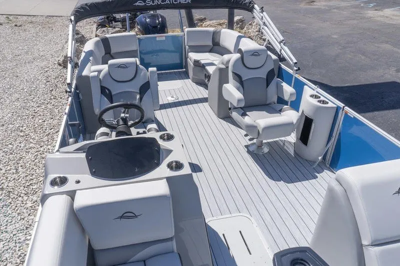 Slide: The Image of 2026 SunCatcher Select 322RC pontoon boat with spacious seating and modern design. - 15