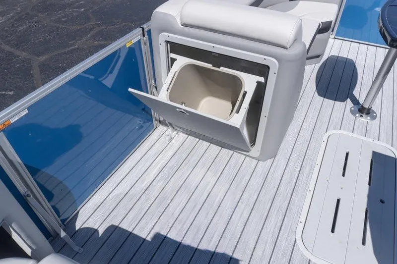 Slide: The Image of Open storage compartment on 2026 SunCatcher Select 322RC boat deck. - 12