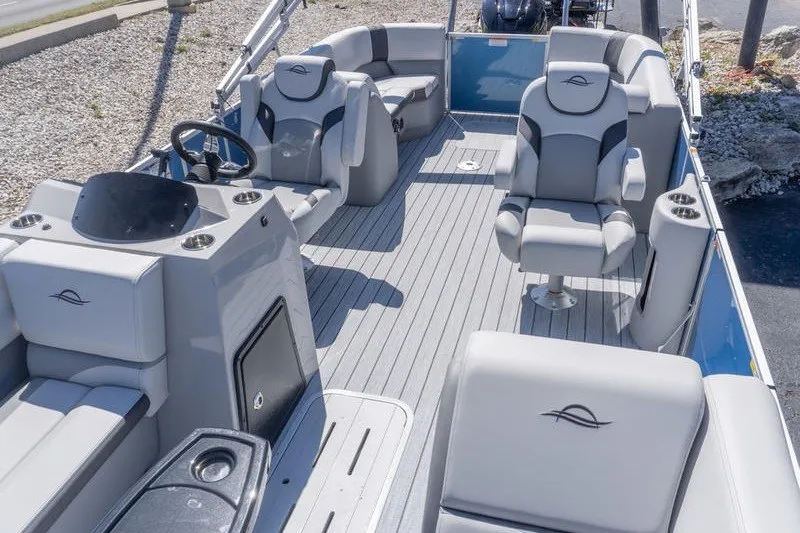 Slide: The Image of 2026 SunCatcher Select 322RC pontoon boat interior with luxurious seating and modern design. - 14