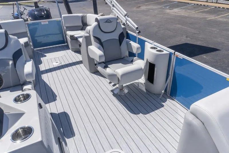 Slide: The Image of 2026 SunCatcher Select 322RC boat interior with luxurious seating and modern design. - 21