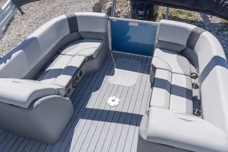 Slide: The Image of Luxurious seating on 2026 SunCatcher Select 322RC pontoon boat, featuring spacious gray upholstery. - 22