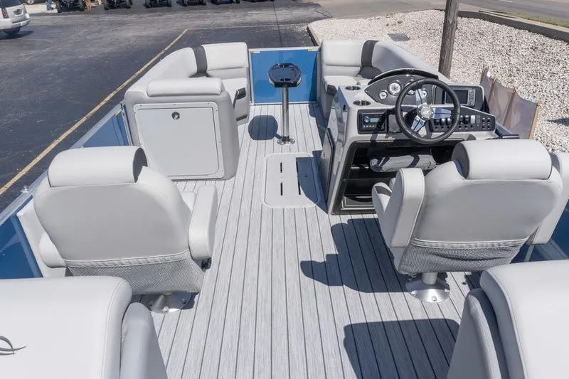 Slide: The Image of 2026 SunCatcher Select 322RC pontoon boat interior with modern seating and steering console. - 5