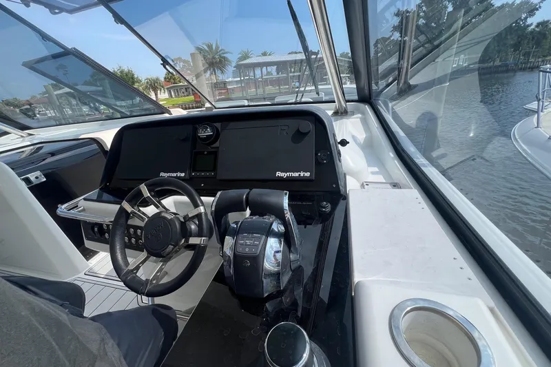 Slide: The Image of Cockpit of 2019 Aquila 36 Sport boat with Raymarine navigation system. - 27