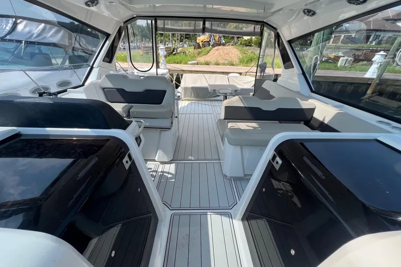 Slide: The Image of Interior view of 2019 Aquila 36 Sport yacht, featuring sleek seating and modern design. - 17