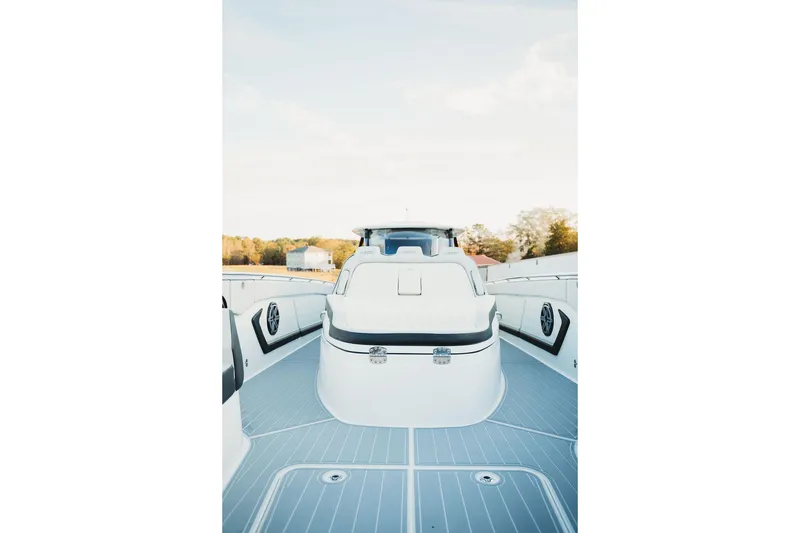 Slide: The Image of 2018 MTI 57 boat deck with sleek design and modern features. - 60