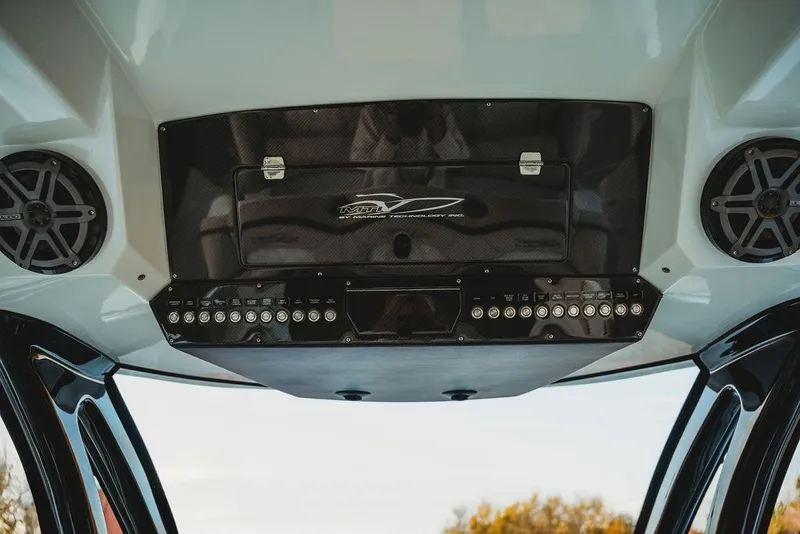 Slide: The Image of Interior view of 2018 MTI 57 boat with speakers and control panel. - 34