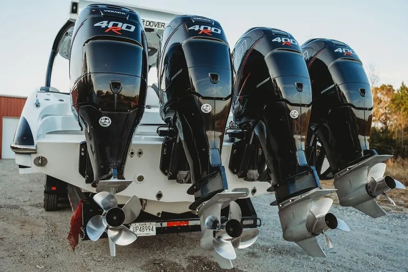 Slide: The Image of Four powerful Mercury 400R outboard engines on a 2018 MTI 57 boat. - 24