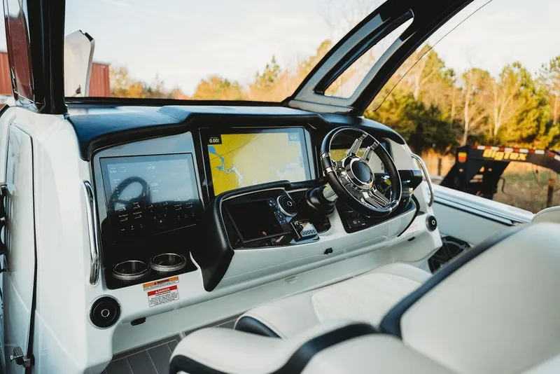 Slide: The Image of Cockpit of 2018 MTI 57 boat with modern navigation system and steering wheel. - 26