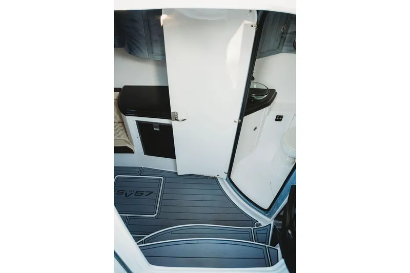 Slide: The Image of Interior of 2018 MTI 57 boat showing cabin with modern amenities. - 51