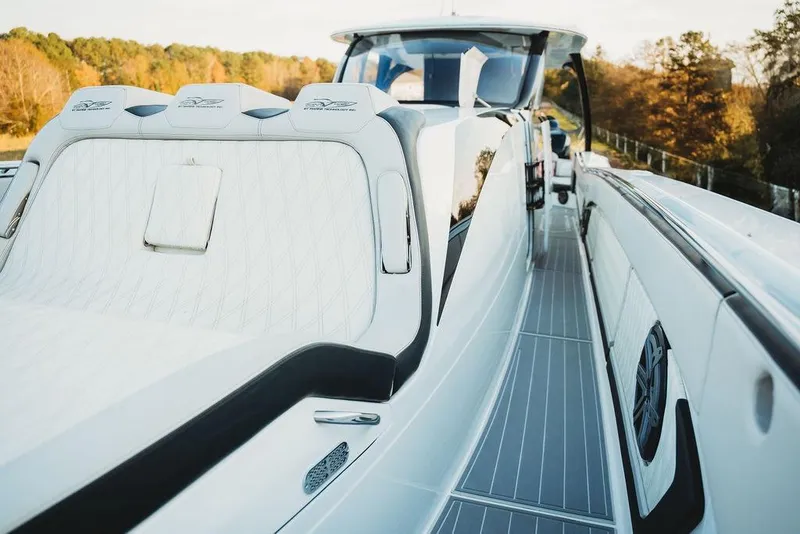 Slide: The Image of Luxurious 2018 MTI 57 yacht with sleek design and plush seating on deck. - 63