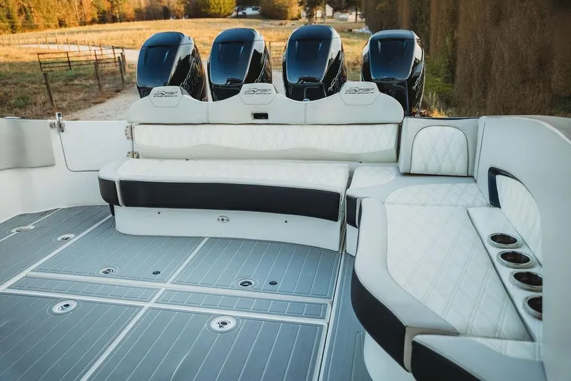 Slide: The Image of Luxurious 2018 MTI 57 boat interior with plush seating and powerful engines. - 68