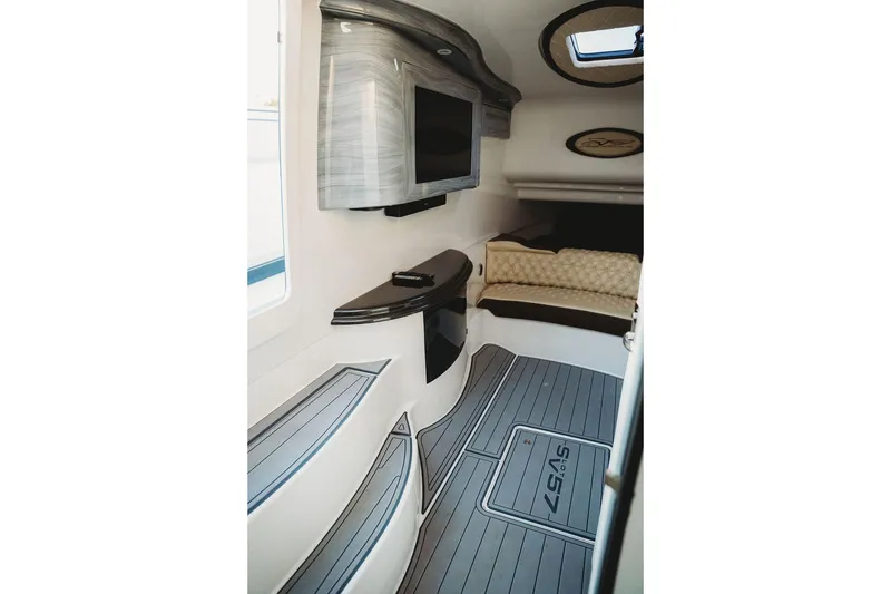 Slide: The Image of Luxurious interior of 2018 MTI 57 boat with modern design and comfortable seating. - 52