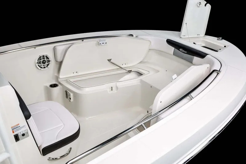 Slide: The Image of Manufacturer Provided Image: 2025 Robalo R202 Explorer boat interior with seating and storage compartments. - 10