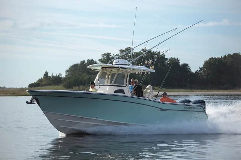 Slide: The Image of Manufacturer Provided Image: 2021 Grady-White Canyon 306 boat cruising on a calm lake. - 31