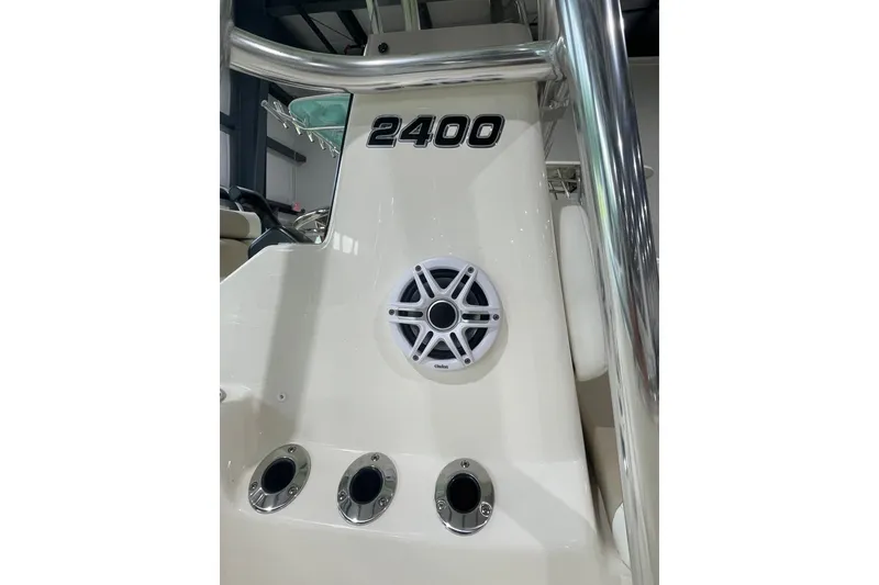 Slide: The Image of 2026 Bulls Bay 2400 boat interior with speaker and chrome details. - 2