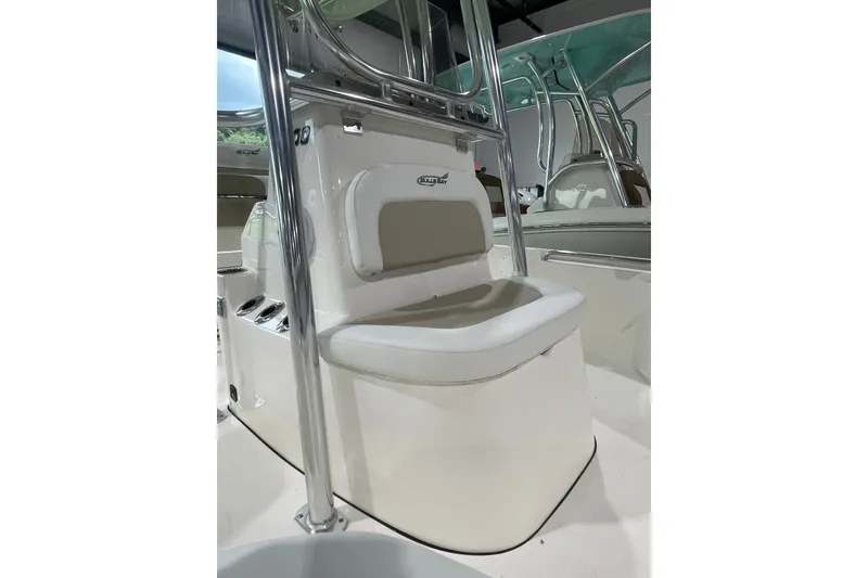 Slide: The Image of 2026 Bulls Bay 2400 boat interior with cushioned seating and sleek design. - 3