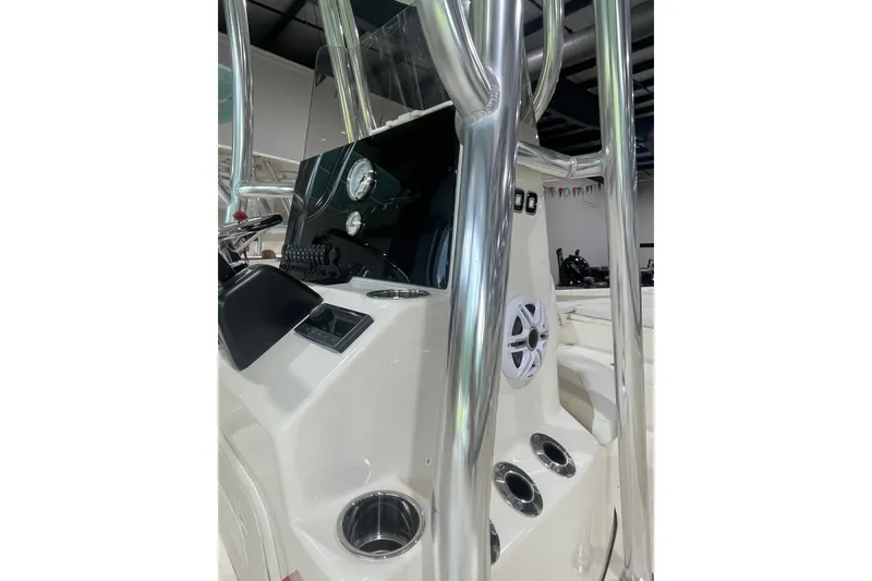 Slide: The Image of 2026 Bulls Bay 2400 boat console with gauges and stainless steel features. - 6