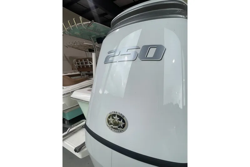 Slide: The Image of 2026 Bulls Bay 2400 boat with 250 horsepower engine, featuring ultra-low emission technology. - 9