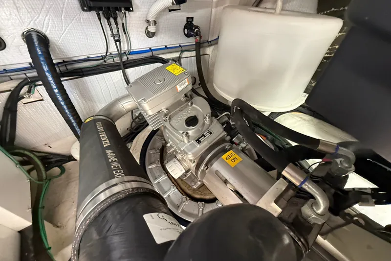 Slide: The Image of Engine room of 2018 Sabre 45 Salon Express, showcasing mechanical components and wiring. - 78