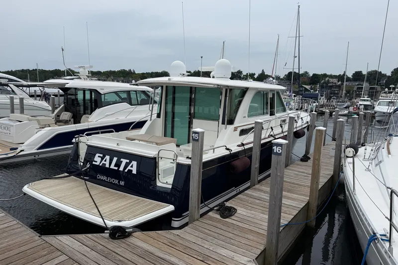 Slide: The Image of 2018 Sabre 45 Salon Express yacht docked at marina in Charlevoix, MI. - 9