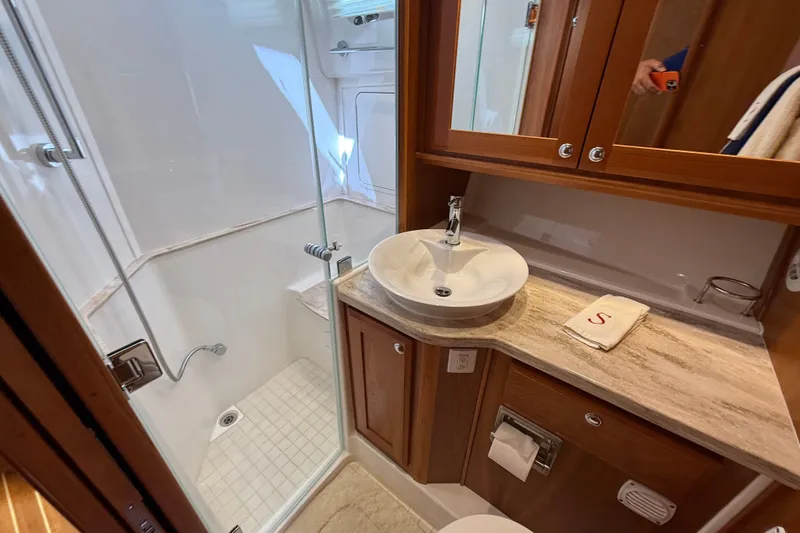 Slide: The Image of Luxurious bathroom in 2018 Sabre 45 Salon Express yacht with modern fixtures. - 58